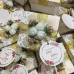 Flowers Box With Zari Ribbon And Tag
