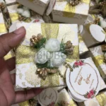 Flowers Box With Zari Ribbon And Tag