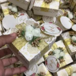 Flowers Box With Zari Ribbon And Tag