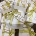 Zari Ribbon Box With Bow And Tag