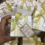 Zari Ribbon Box With Bow And Tag