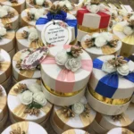 Round Bid Box With Pink Ribbon