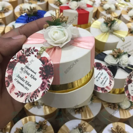 Round Bid Box With Pink Ribbon