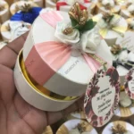 Round Bid Box With Pink Ribbon