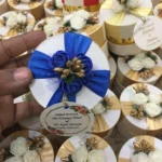 Round Bid Box With Blue Flowers & blue Ribbon